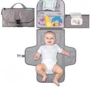 Portable/travel change pad with pockets